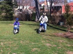 Helen and bill ride their TT-R s in the back yard